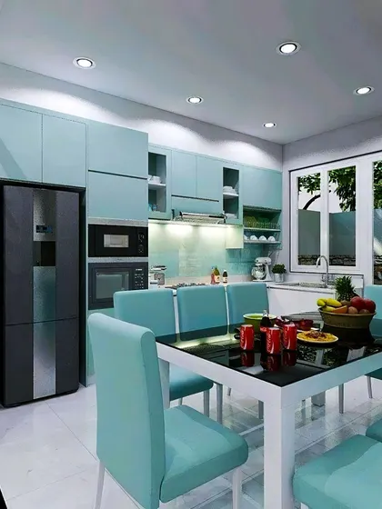 This design cleverly integrates a dining area directly into a compact kitchen layout. The pastel blue-green cabinets add a soft touch of color, creating a functional and charming space for both cooking and family meals.