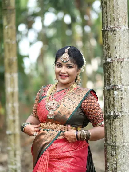 Different poses of a bridesmaid wearing a full antique temple jewellery set, showing how my pieces are perfect for the entire bridal party.