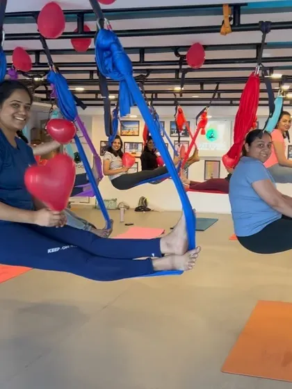 A duplicate of the fun, playful moment in the aerial hammocks.