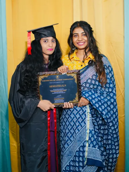 Presenting the certificate to another one of my talented students.