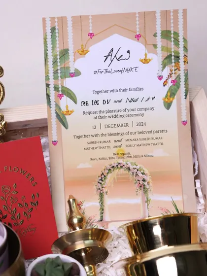 A detailed view of the custom wedding invitation card, featuring beautiful illustrations and personalized details for the couple's big day.