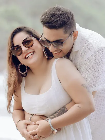 The pure joy of a candid moment on the sunny shores of Goa. This image reflects our ability to capture natural, unposed laughter and affection, perfect for couples who want their pre-wedding shoot to feel like a relaxed, happy getaway.