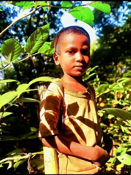 This image from 1985 remains special to me. I found this little tribal lad in the northern zone of SGNP. He held a dead bird, a Puff-throated Babbler, hunted with a simple arrow. He knew the living forest in a way that is now almost lost.
