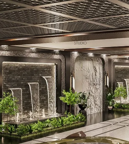 A closer look at the water features in the stilt area. The combination of cascading water, lush planters, and textured walls creates a serene and dynamic environment from the moment you arrive home.