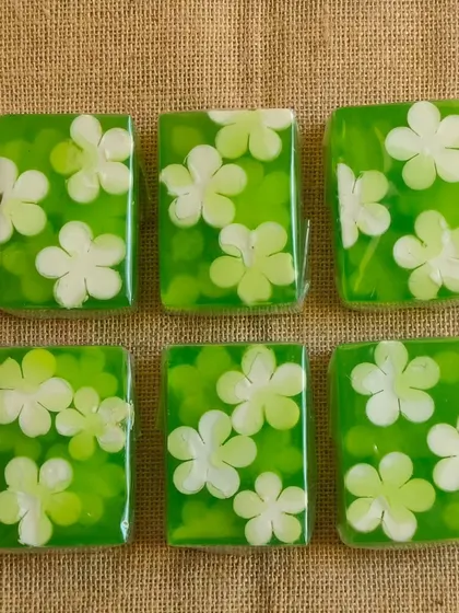 Fresh green and white floral soaps, made with a clear glycerine base.
