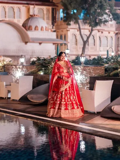 A repeat of the grand poolside bridal portrait, a testament to its cinematic quality and a showcase of destination wedding photography.