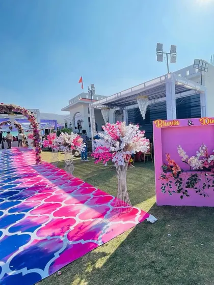 A custom photo frame with the couple's name for a Haldi event. This provides a fun and personalized spot for guests to take pictures.