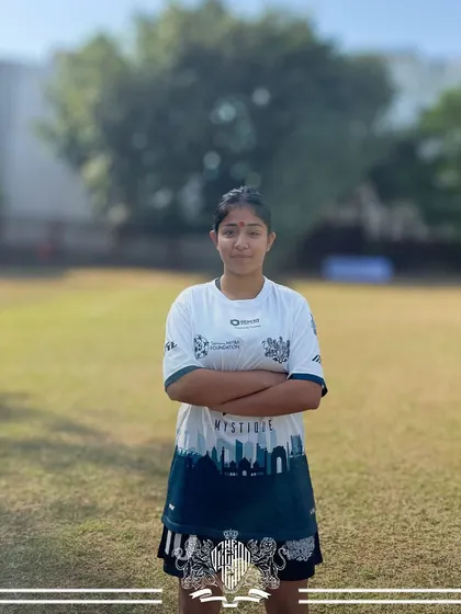 Strength and focus personified. This player portrait highlights the determination that fuels our Dream Team, fueled by our partners Jishnu Mitra Foundation, Genesis Global School, and Mystique.