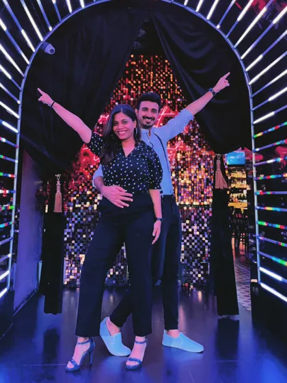 Neon lights and dance delights. This is a classic dance pose that captures our energy as choreographers and partners.