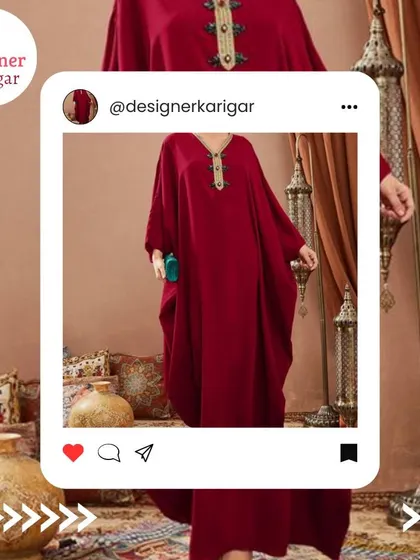 A beautiful deep red kaftan with a detailed neckline. This is a perfect example of a simple yet elegant modern kaftan design.