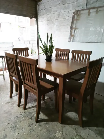 The dining set in our workshop, ready for delivery. We take pride in crafting every piece to perfection.