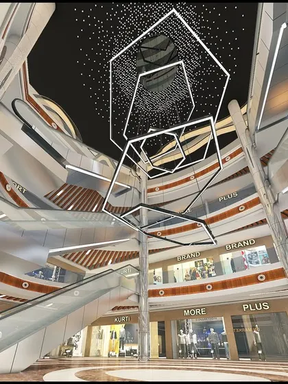 The interior atrium of LP Walk Mall, showcasing a dynamic, multi-level space with interconnected escalators. The design focuses on creating fluid circulation and visual excitement to enhance the shopping experience.