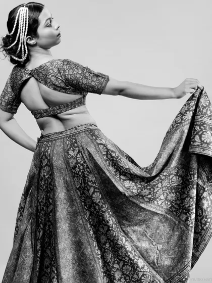 A black and white version of the previous shot, emphasizing the movement of the fabric.