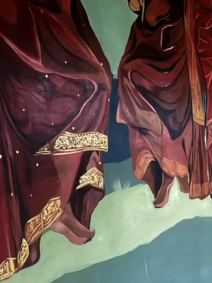 A close-up of the detailed clothing on the dancing women in the Coorg mural. I used gold paint to highlight the intricate patterns on their sarees.