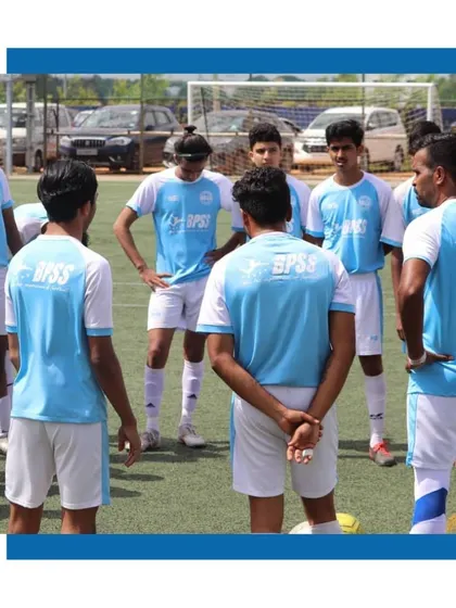 A team huddle before a match. This is where we unite, focus our minds, and prepare to play as one. Teamwork is the core of our success.