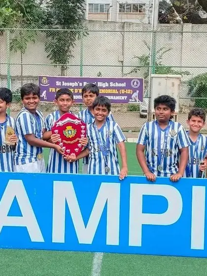 A clean sweep for the youngest champs. The SJBHS U-12 team celebrating their victory, showing that it's never too early to learn the values of teamwork and competitive spirit.