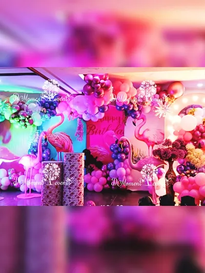 A detailed shot of the flamingo stage, showcasing the rich colors, mushroom props, and intricate balloon work.