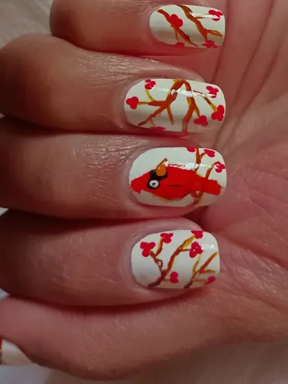 A full hand view of the winter berries design, demonstrating how the pattern flows across all the nails.