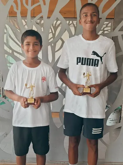 Aarav Chhallani with his partner after their U-16 All India Championship Series Doubles Runners-up finish in Kalina.