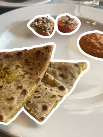 Stuffed parathas with a side of baked tomatoes and chutney. Wholesome, satisfying, and completely aligned with a healthy lifestyle.