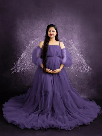 A dreamy portrait with sparkling angel wings. This theme is perfect for moms who want a touch of fantasy and magic in their photos.
