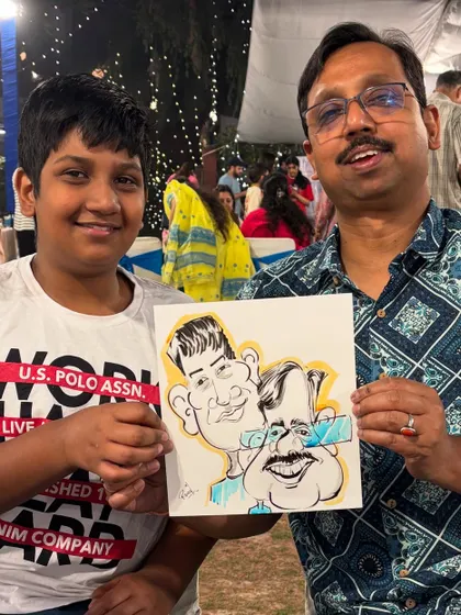 A father and son duo with their caricature, a wonderful keepsake for the family.