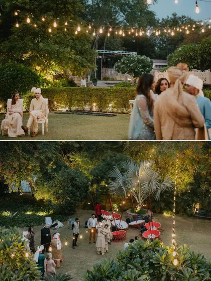 The magical atmosphere of an outdoor evening event in Jaipur. The string lights and lush gardens create a romantic and enchanting setting for guests to mingle.