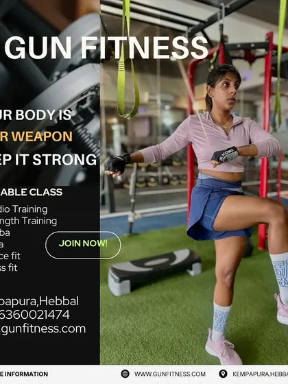 Your body is your weapon, keep it strong. This image shows a member performing a step-up, a key exercise in our cardio and strength training classes. We provide all the equipment you need for a complete workout.