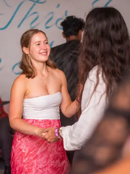 A young dancer with a big smile, enjoying her time on the floor. Dance is for everyone.
