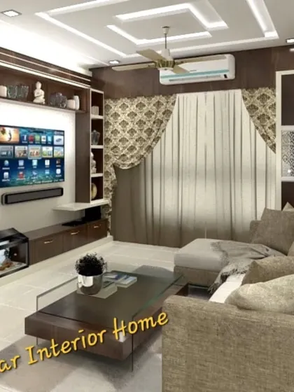 This living room design showcases a dark wood entertainment unit with integrated shelving. The layout is perfect for family movie nights and relaxation.