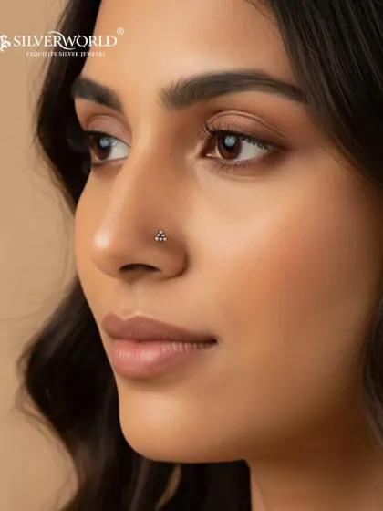 A perfect example of minimal elegance, this tiny three-dot silver nose pin is one of our most popular items for daily wear. It's handcrafted from pure 92.5 silver and designed to add a subtle sparkle.