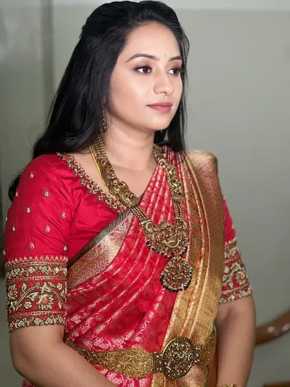 This look features a softer, more natural approach to traditional bridal makeup. You'll learn how to create a dewy, minimal base and pair it with loose waves for brides who want a blend of tradition and modern simplicity.