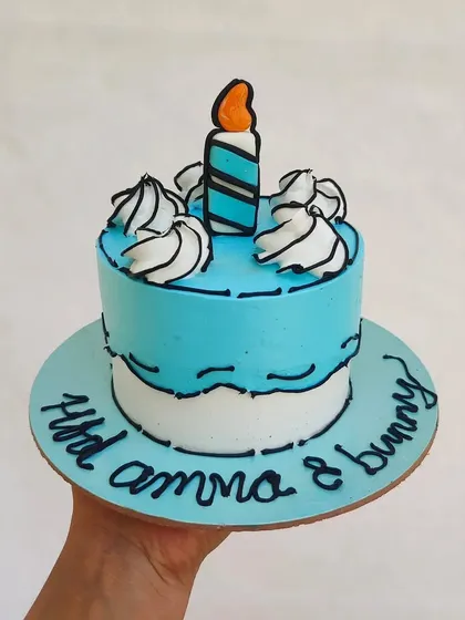A blue comic cake with a personalized message. This style is always a conversation starter at parties.