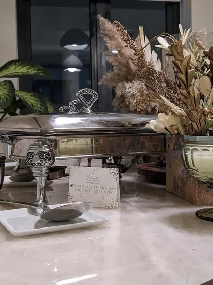 Even a single chafing dish can be presented with elegance. This setup for Mexican soft cottage cheese tortillas shows my attention to detail in every aspect of the service.