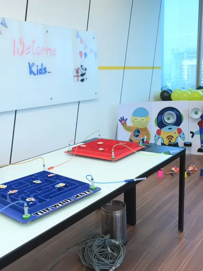 A view of our game zone setup at a corporate office, featuring multiple steady-hand mazes ready for players. We create an inviting and well-organized activity area.