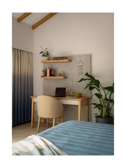 A well-designed workstation, like this one with its soft-upholstered chair and ample natural light, can transform daily tasks into moments of inspiration. We blend ergonomic comfort with visual appeal to support long hours of productivity.