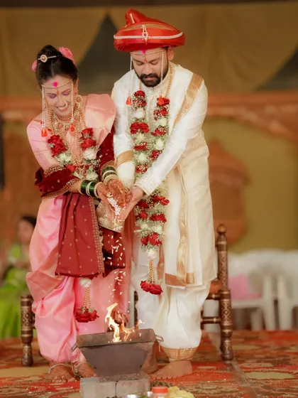 Documenting sacred rituals is a core part of my wedding coverage. Here, the couple participates in the fire ceremony, a moment I capture with respect and an eye for its profound beauty.