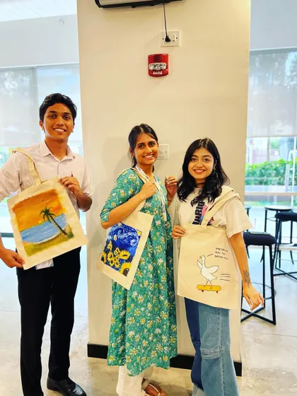 More happy faces from a tote bag painting session. It's a fun, practical, and creative activity for any group gathering.
