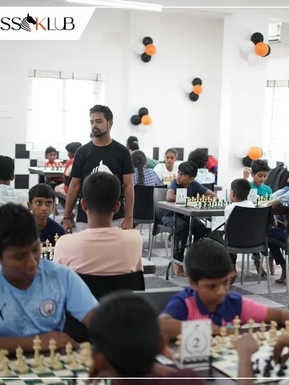 An arbiter oversees the games at our Coimbatore opening tournament, ensuring fair play and adherence to Swiss system rules.