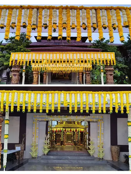 A beautiful temple entrance decorated with traditional yellow and white flower garlands. The decor perfectly complements the temple's architecture, creating a seamless and divine entryway.