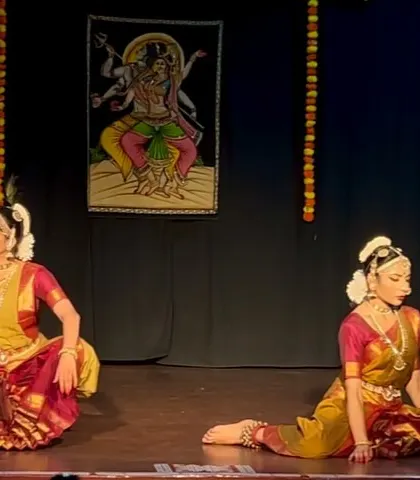 A moment of perfect synchronicity during a duet performance for World Dance Day. Dancing with a partner brings a unique dynamic of contrast and connection to the stage.