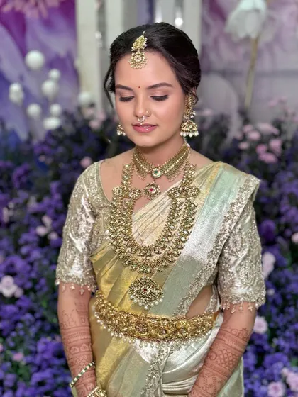 A final, serene portrait of Sushmitha, the quintessential South Indian bride.