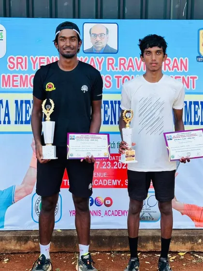 A closer look at Oges with his singles and doubles trophies from the Sivakasi tournament. A truly dominant performance.