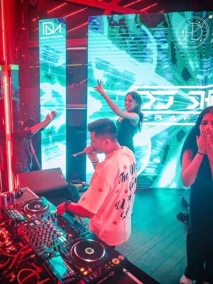 That priceless reaction. A fan is completely starstruck as I get on the mic at FLO, a perfect candid moment showing the personal connection I build during my sets.