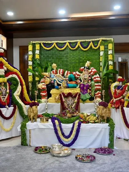 The entire pooja setup, a beautiful display of devotion and tradition. Our saree plays a special role in honoring the Goddess.
