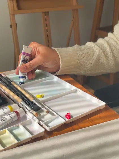Squeezing paint onto my palette, getting ready for a new creation. The anticipation is part of the process.