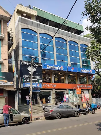 Another view of the building before our intervention, showcasing the plain and generic commercial architecture that we aimed to reinvent.