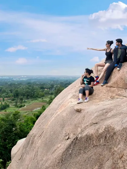 Taking a moment to soak in the panoramic views from the top. Our hiking trails lead to breathtaking vistas that make the climb completely worth it.