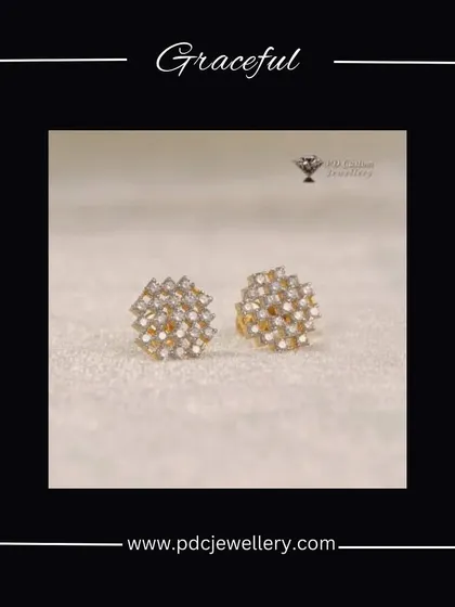 A graceful pair of 18kt hallmarked gold and diamond studs. The multi-layered, textured design creates a brilliant sparkle from a cluster of small diamonds.