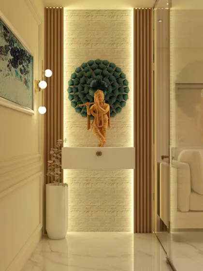 A minimalist yet elegant puja corner featuring a wooden Krishna idol against a textured stone wall. The design uses subtle backlighting and a simple floating shelf to create a tranquil and modern sacred space.